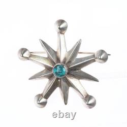 C1950's Vintage Native American sterling silver cast star pin/brooch withturquoise