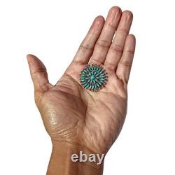 Detailed wagon wheel Zuni Blue Gem Turquoise Needlepoint Sterling Silver Pin