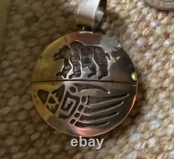 NAVAJO DOROTHY MARTINEZ STERLING SILVER SPINNER PENDANT BADGER PAWith BEAR PAW
