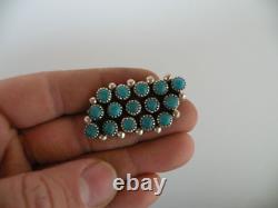 Native American grade A+ petit point Turquoise Sterling pin brooch by Tom Begay