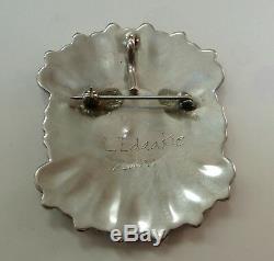 VINTAGE INDIAN STERLING SILVER ZUNI SUN FACE PIN/PENDANT signed E. EDAAKIE