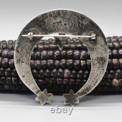 VINTAGE NAVAJO-CAST STERLING SILVER NAJA WITH STARS PIN by MILDRED PARKHURST