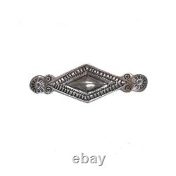 Vintage Navajo sterling silver chiseled repousse pin