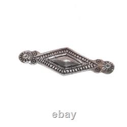 Vintage Navajo sterling silver chiseled repousse pin