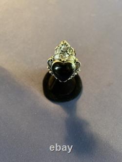 Vintage sterling silver Navajo Manygoats black onyx heart flowers pendant/pin