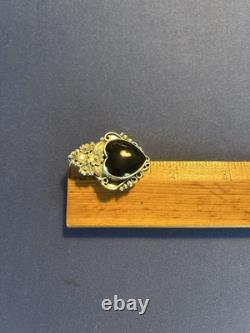 Vintage sterling silver Navajo Manygoats black onyx heart flowers pendant/pin