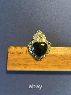 Vintage sterling silver Navajo Manygoats black onyx heart flowers pendant/pin